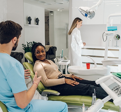 a dentist consulting with a patient