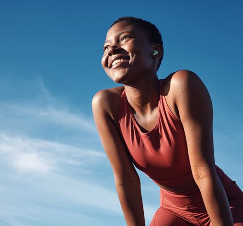 Lady smiles outdoors