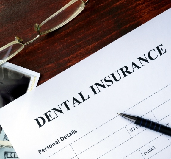 Dental insurance paperwork on desk