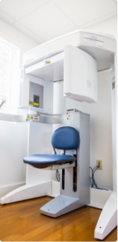 Dental scanning machine standing against wall