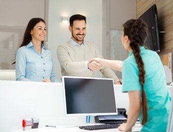 patients smiling with team member in Jackson
