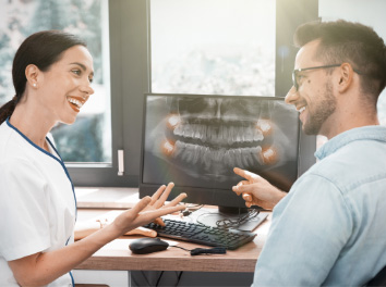 person smiling with team member