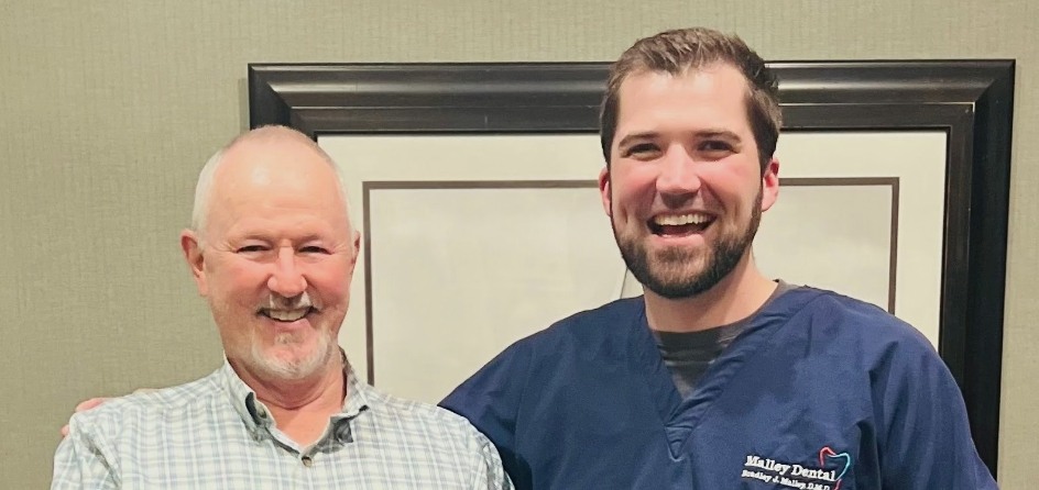 Two smiling Jackson dentists at Lakeland Dental Care
