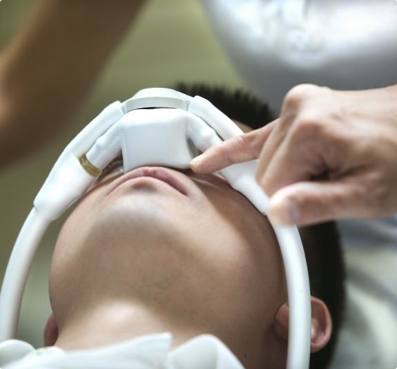 Dental patient wearing nitrous oxide sedation mask on his nose